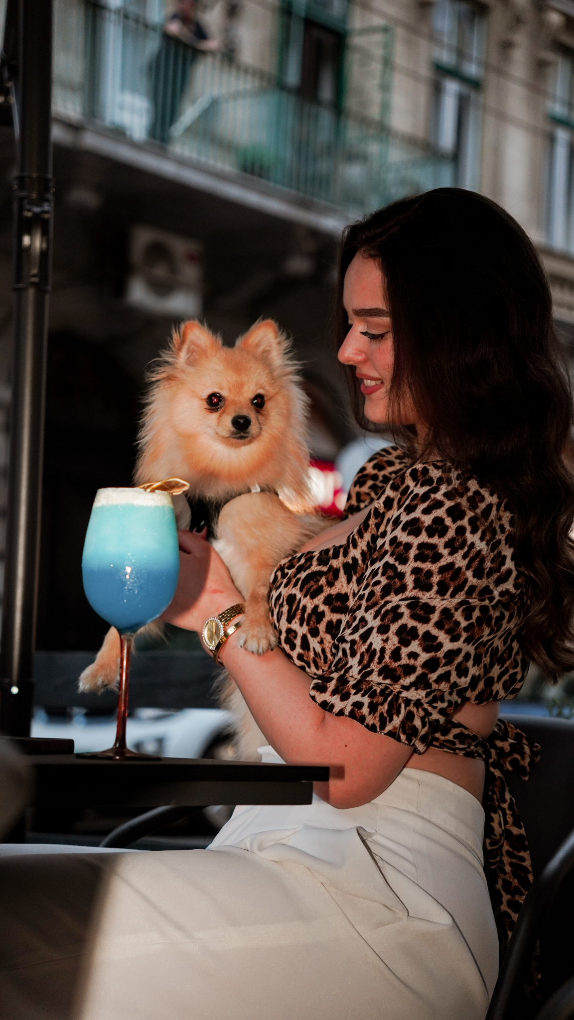 Dog-friendly moment with a blue signature cocktail