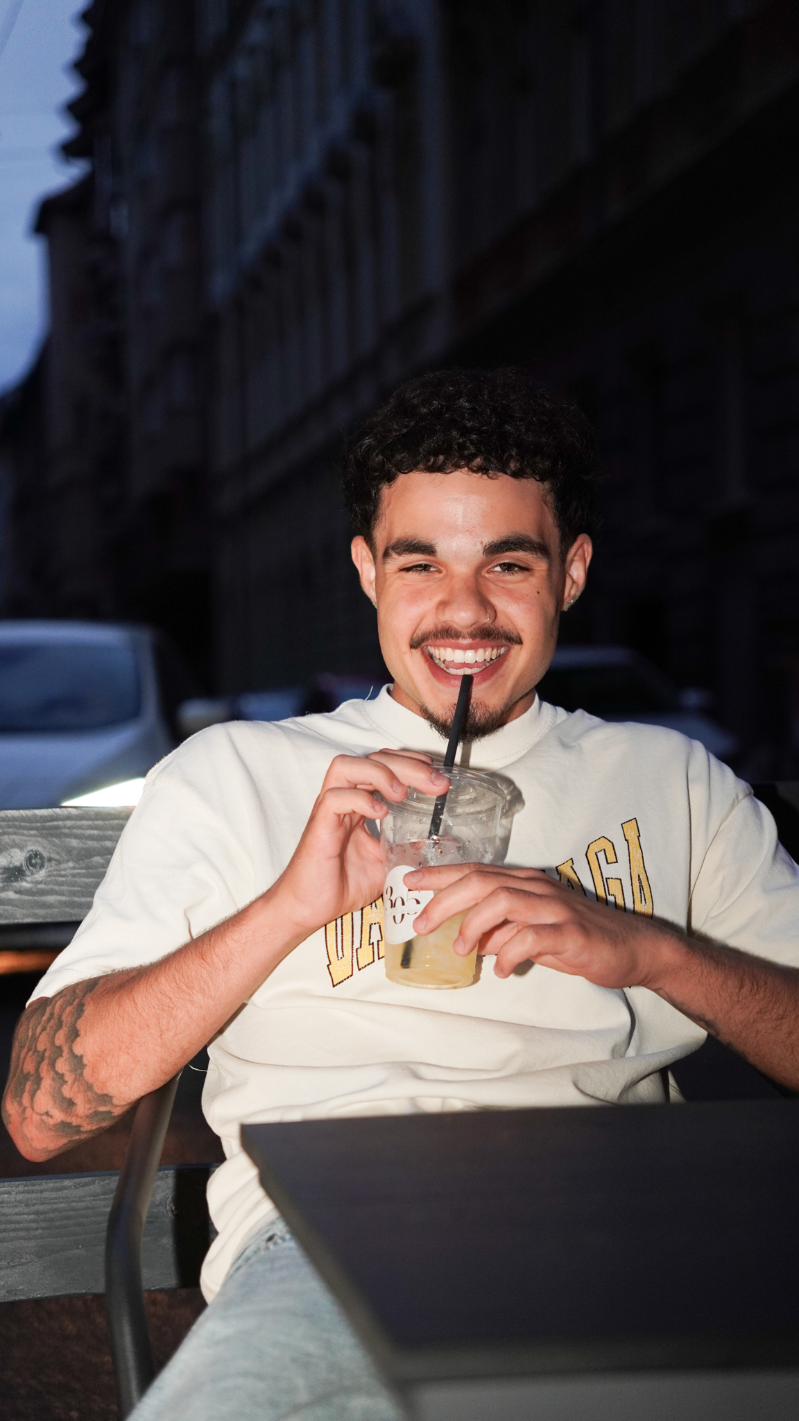 Guest enjoying a drink on the 305 Budapest terrace